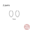 Twisted sterling silver round ring earrings in golden and white gold finishes