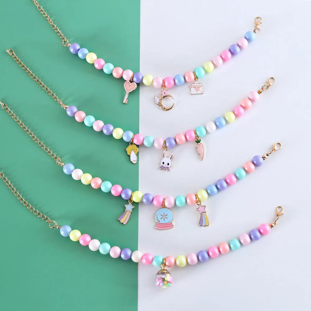 Macaron-themed colourful resin collar and bracelet set for cats or dogs in six design options.