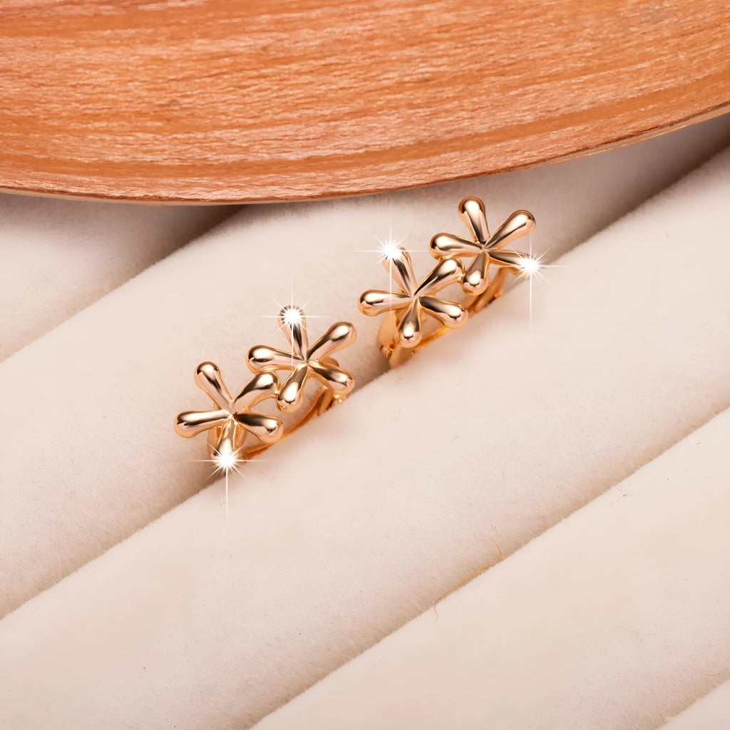 Circular rose gold electroplated earrings with waterdrop flower pattern for women