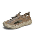 Men's black sports sandals with leather mesh upper, elastic band and non-slip rubber sole.