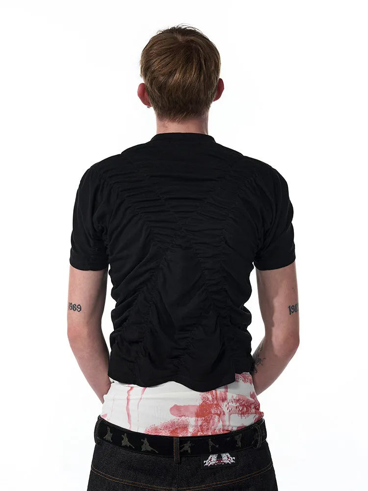 Black slim fit men's t-shirt with short sleeves and a printed design, laid flat.
