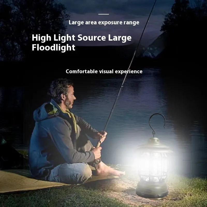 Dark green portable camping head lamp lantern with dimensions 16.6cm by 6.7cm by 9.6cm