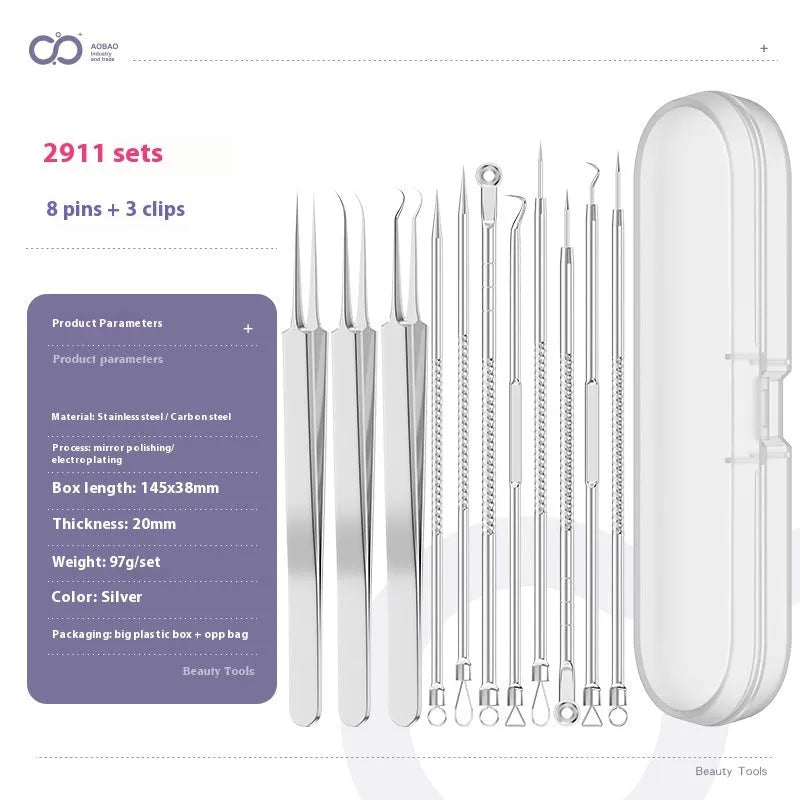 Four silver metal acne needles with pointed tips laid out on a surface.