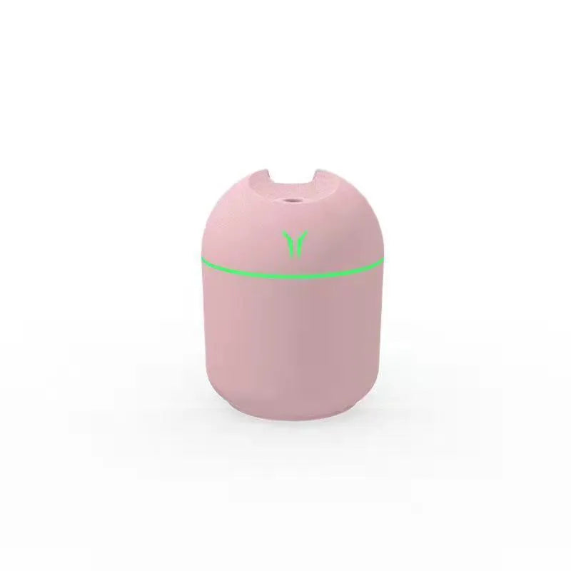 Round desktop humidifier with USB power cable and 250ml water tank capacity