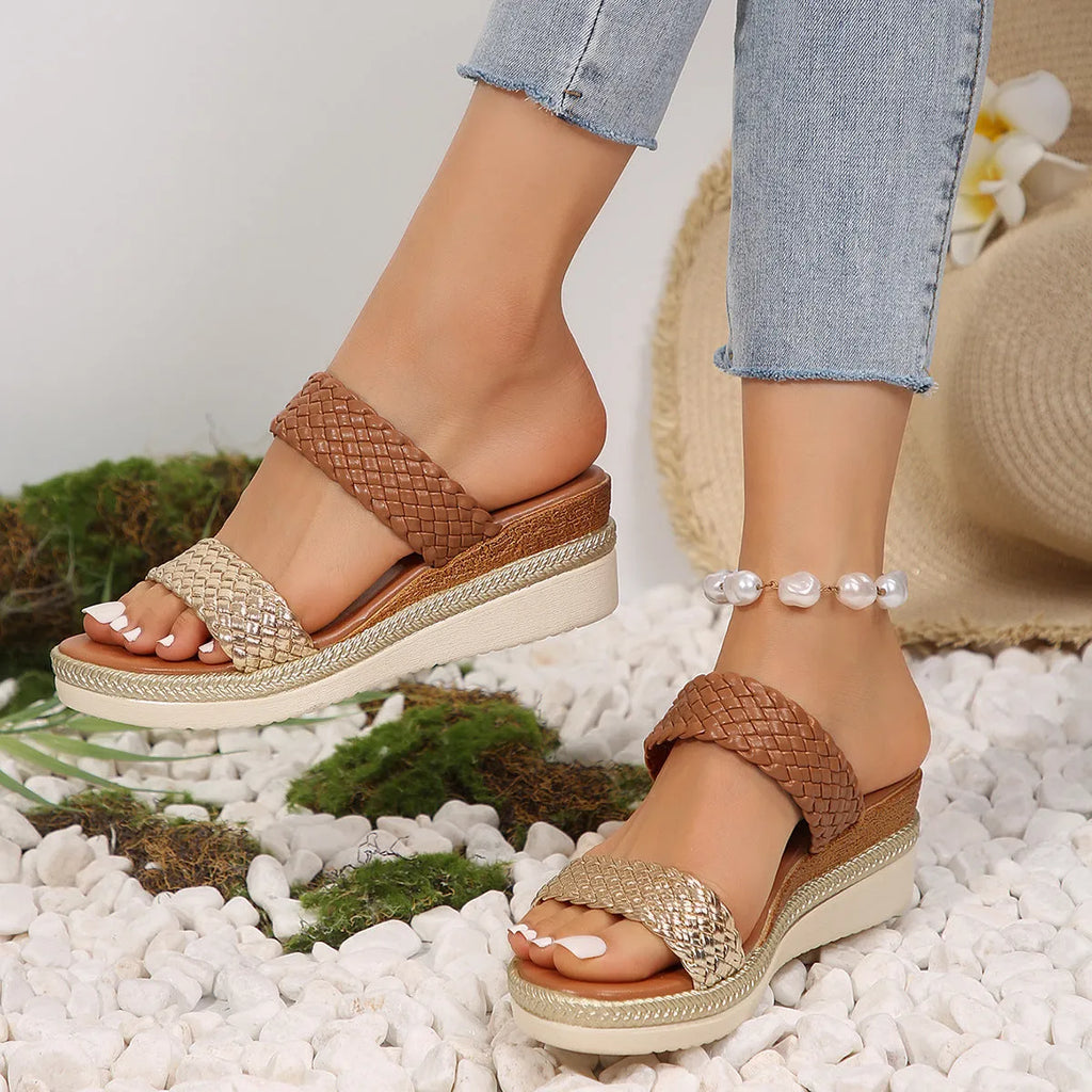 Women's metallic gold wedge sandals with adjustable strap and rubber wedge sole