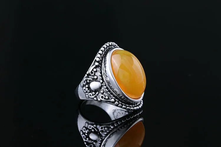 Retro geometric alloy ring with fluorescent beeswax plating in antique silver amber colour.