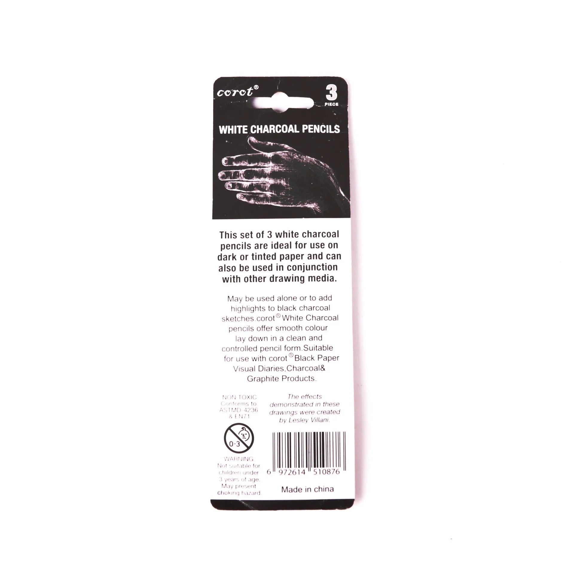 Set of three white charcoal pencils with wooden barrels and moderate hardness