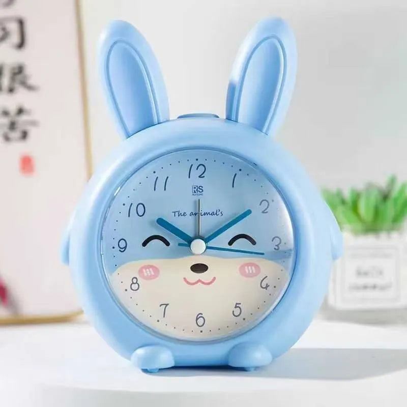 Children's cartoon alarm clock with night light in pink or blue colour