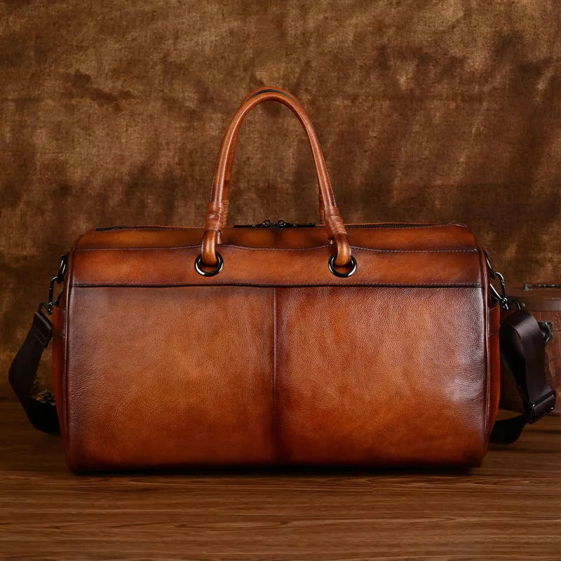 Handmade retro style leather bag in vintage brown made from top-grain cowhide.