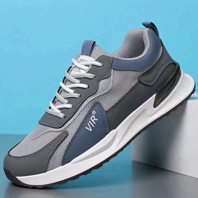 Men's colour block mesh sneakers in black, grey, and white with a lace-up design.