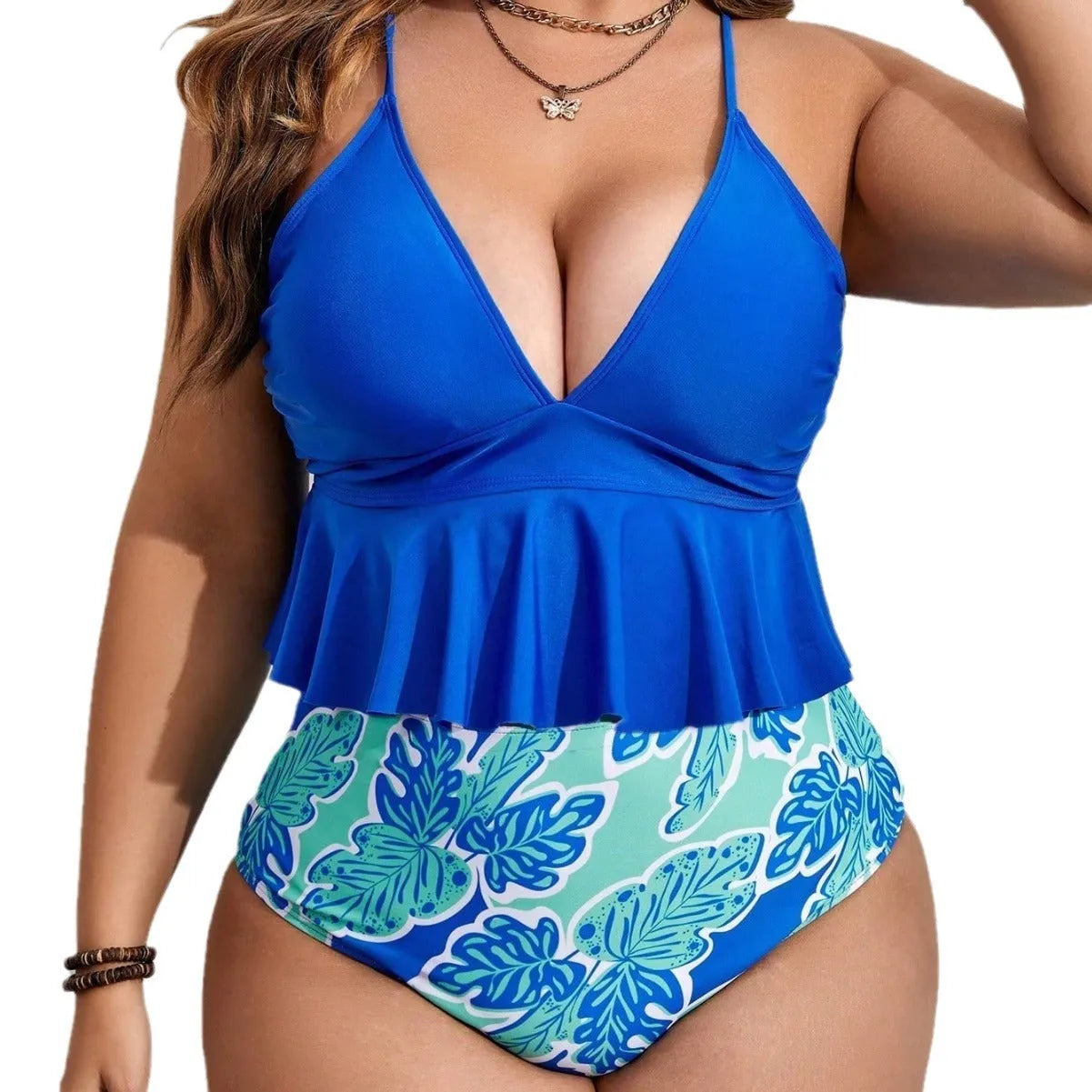 Blue two-piece polyester bikini set on a mannequin, showing top and briefs-style shorts.