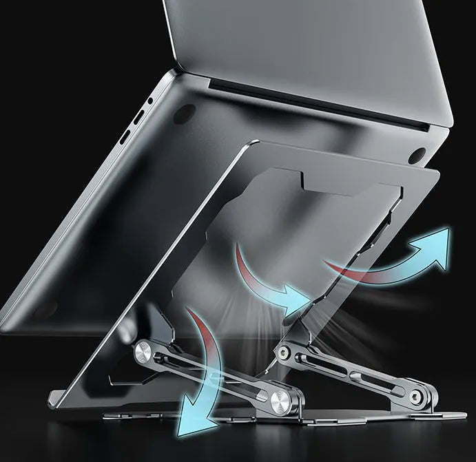 Grey aluminium adjustable laptop stand holding a silver laptop on a wooden desk.