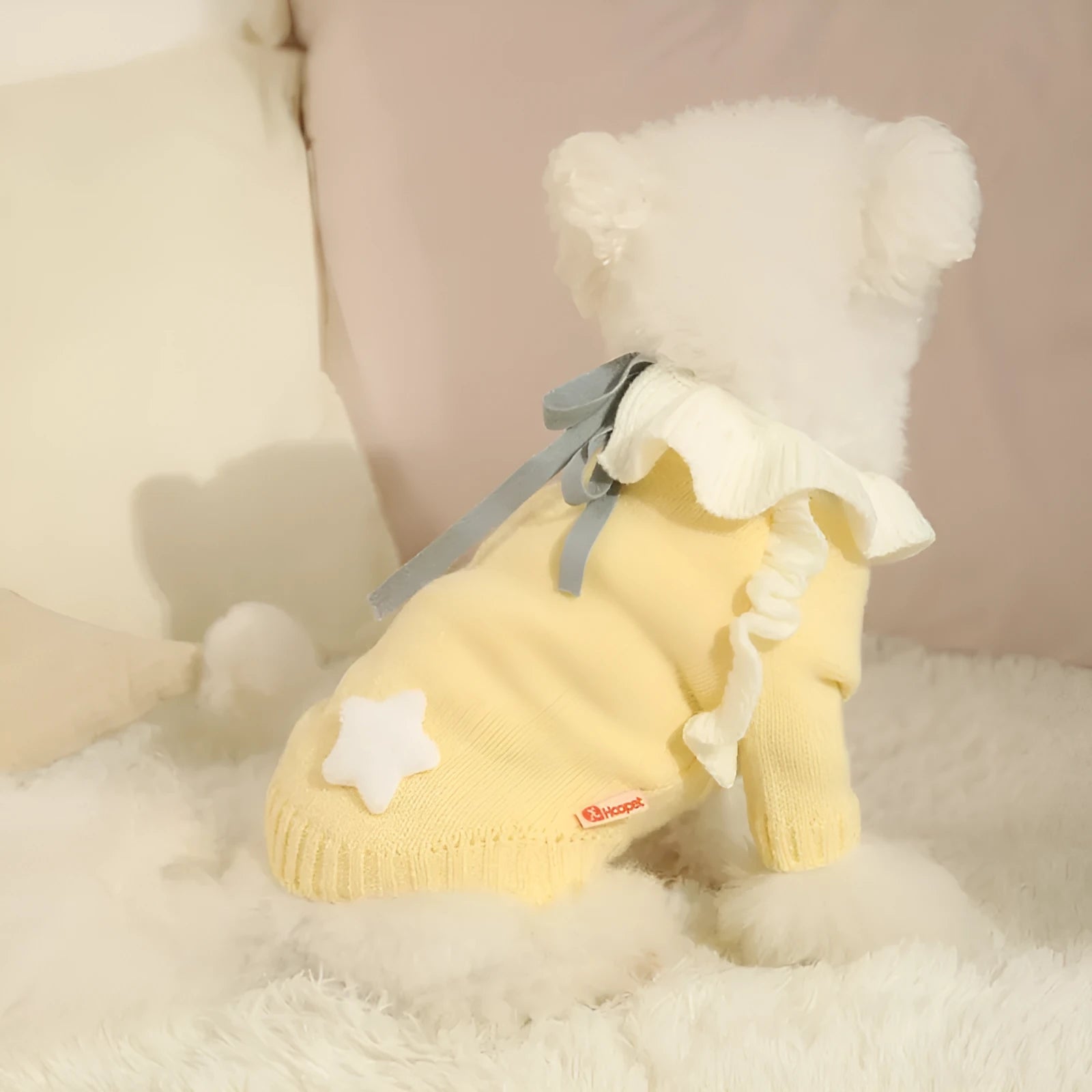 Yellow or patterned fairy dress acrylic knit sweater for small dogs on a mannequin.
