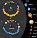 Two natural stone beaded bracelets showing zodiac designs on adjustable cords