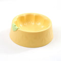 Green flower-shaped plastic pet bowl for cat or small dog food and water