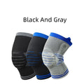 Close-up of a grey and blue cotton knee pad showing the silicone massage spring bar and shock absorber design.
