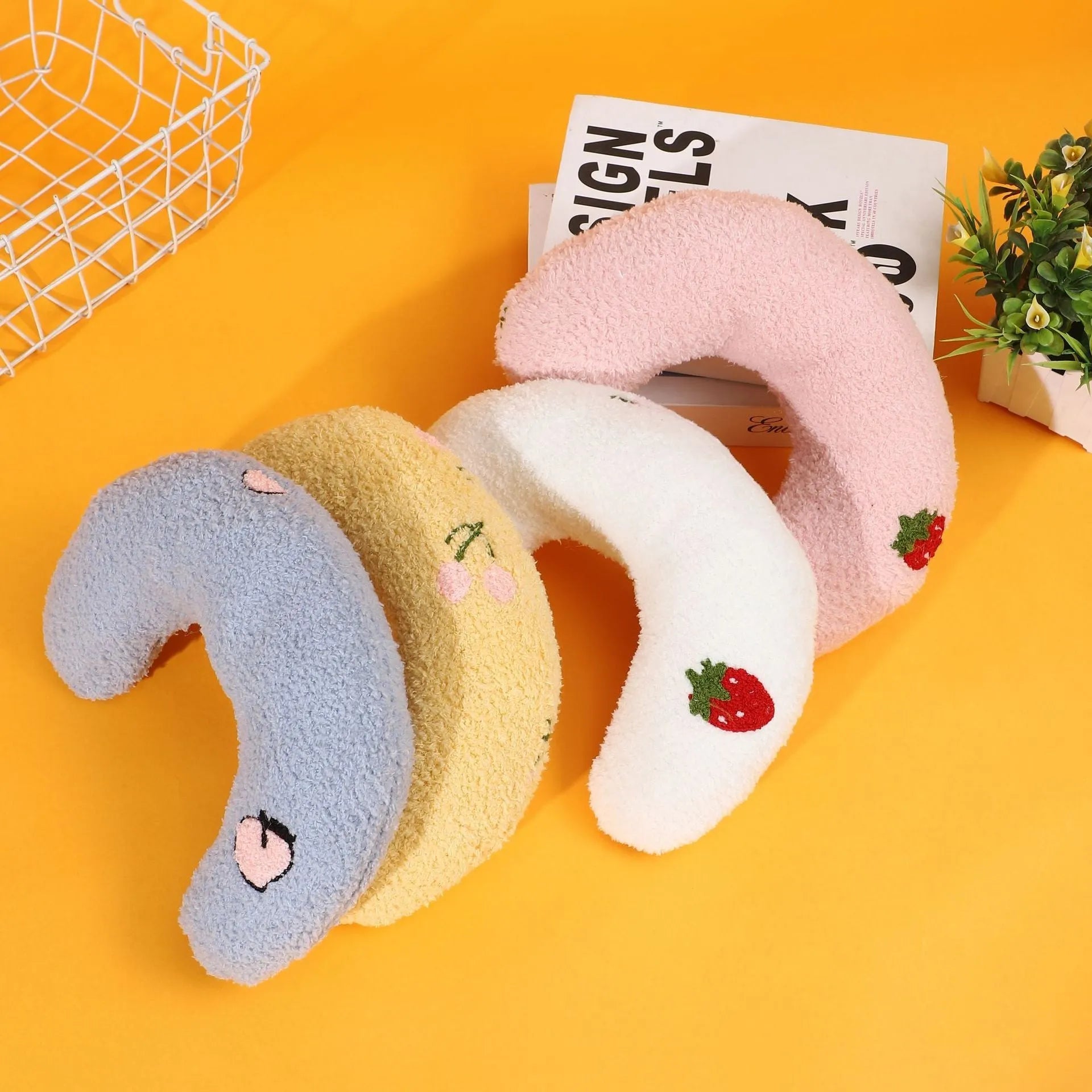 Half moon shaped U-design pet pillow for dogs and cats in blue, pink, white, or yellow colours