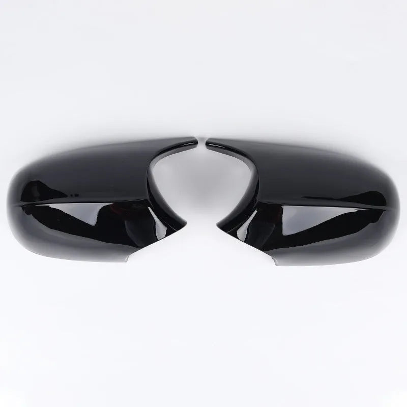 Pair of BMW 3 Series E90 ABS plastic rearview mirror housings in black and carbon pattern finishes