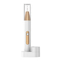 Gold coloured ultrasonic tooth cleaning device with metal scaler tip for tartar and stain removal.