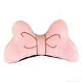 Plush bow tie helmet decoration in red, peach pink, or rose pink colours with elastic strap.