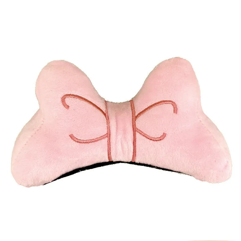 Plush bow tie helmet decoration in red, peach pink, or rose pink colours with elastic strap.