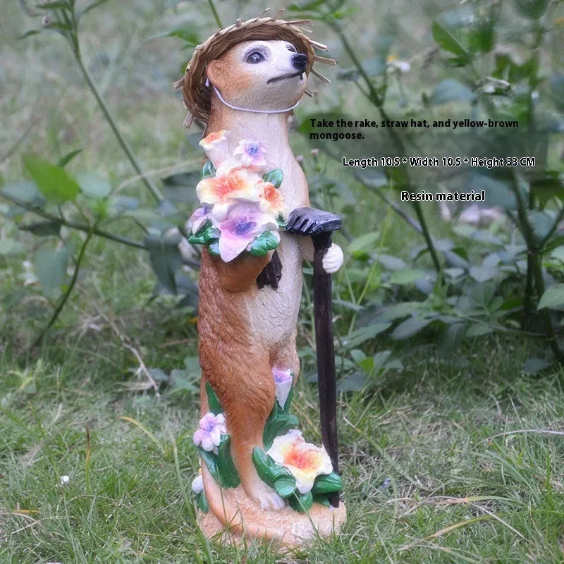 Straw hat wearing mongoose garden ornament in synthetic resin