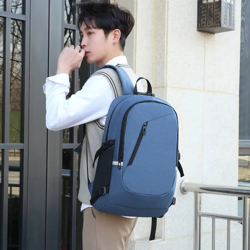 Grey Oxford cloth computer backpack showing front compartment and shoulder straps