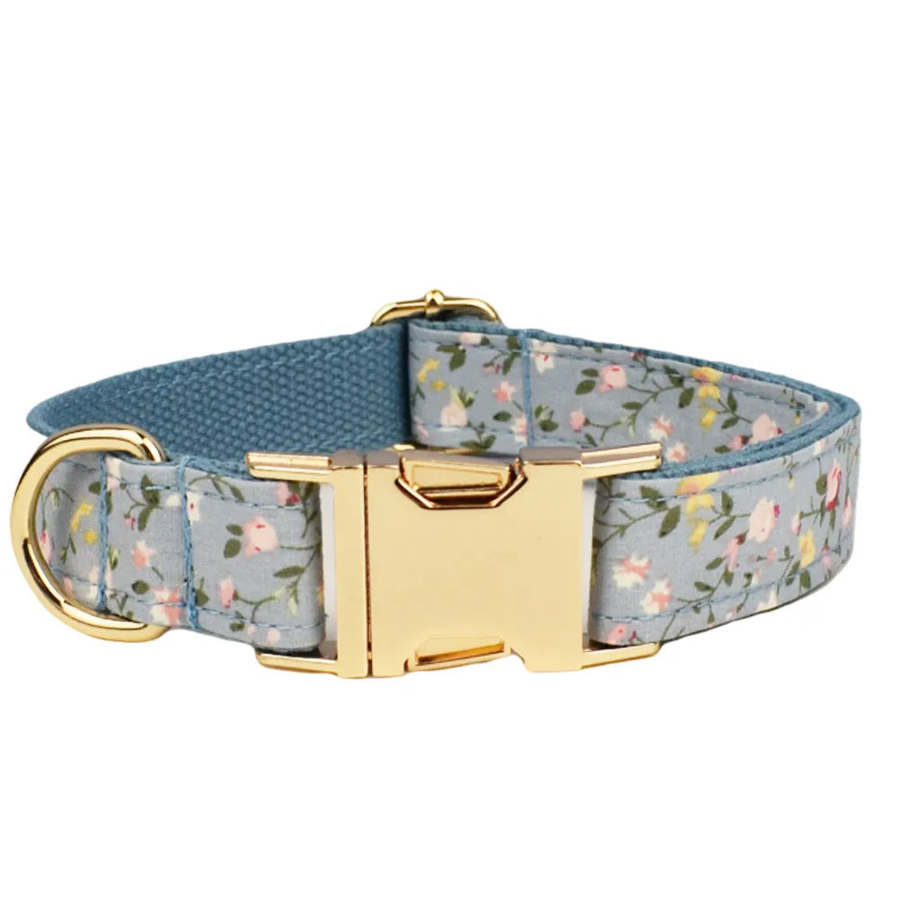 Blue floral polyester cotton dog collar set with leash, bow, vest and poop bag accessories