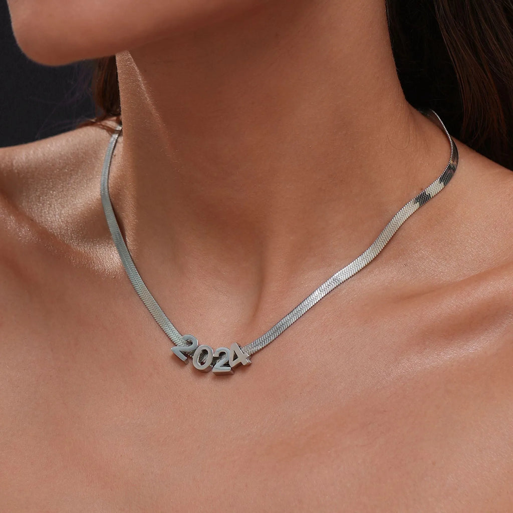 Personalised titanium steel necklace with a letter charm on a 40.5cm electroplated chain.