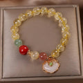 Women's bracelet with natural citrine jade ruyi pendant in yellow hair crystal on alloy chain