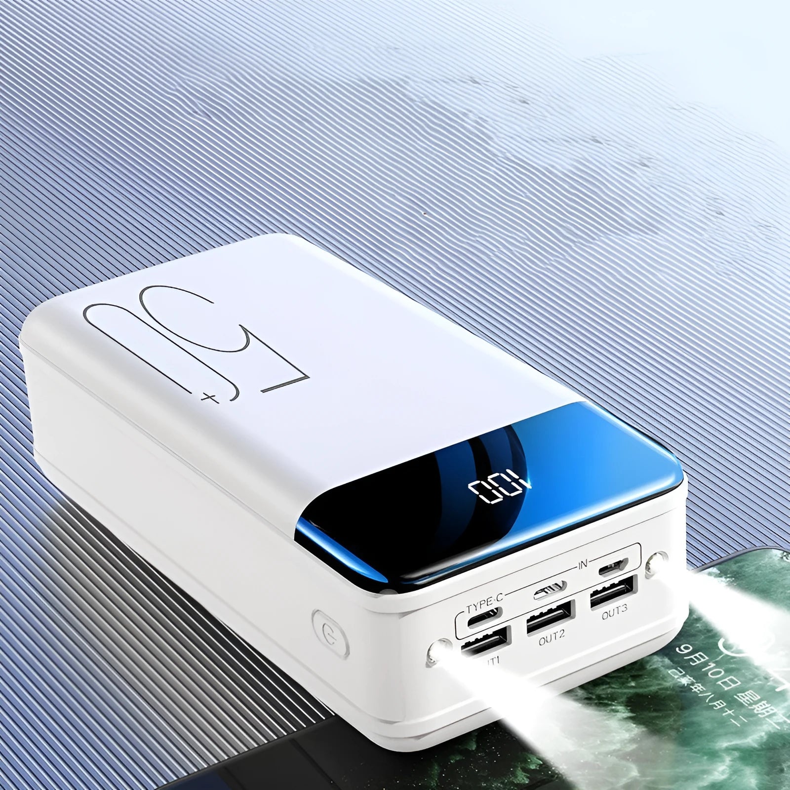 Black or white 50000mAh power bank with three USB output ports showing size scale