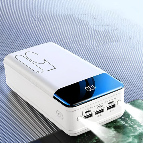 Black or white 50000mAh power bank with three USB output ports showing size scale