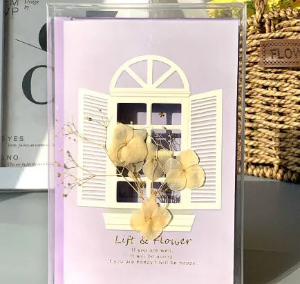 Handmade 3D butterfly-shaped birthday card with artificial flowers and hot foil stamping details.