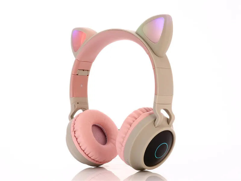 Cartoon cat ears wireless Bluetooth gaming headset showing colour options including pink, light blue, purple, skin tone, and green