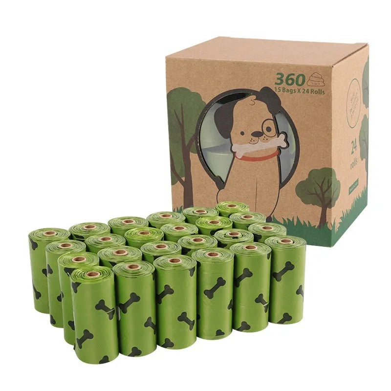 Roll of army green degradable dog poop bags with black bone print, showing bag size scale