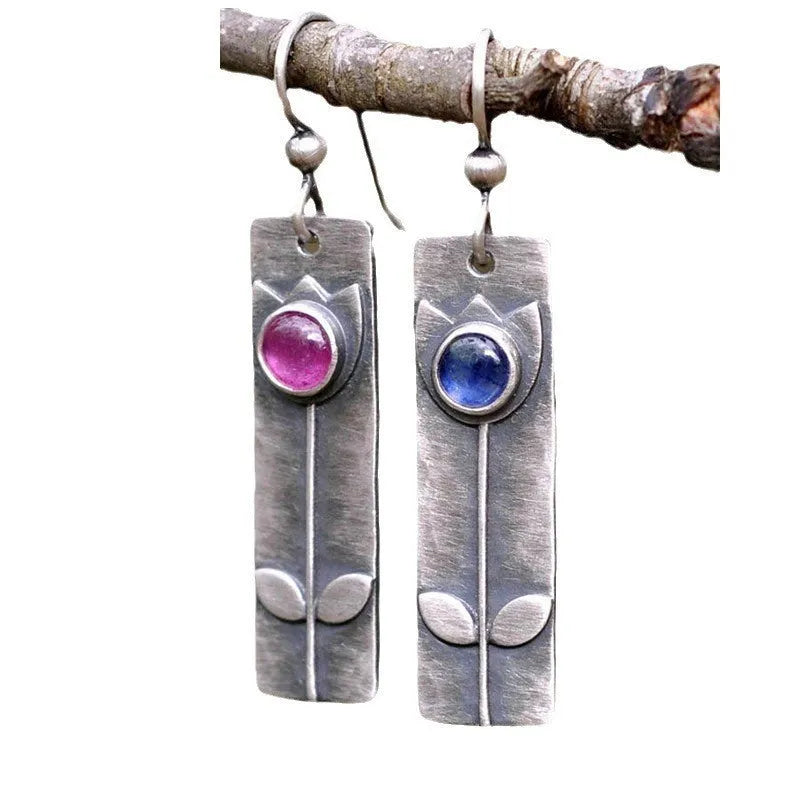 Antique finish red sapphire earrings with geometric shape and ellipse elements in retro style