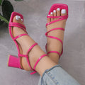 Plus size beige open toe slippers with square head and ankle buckle on a neutral background.