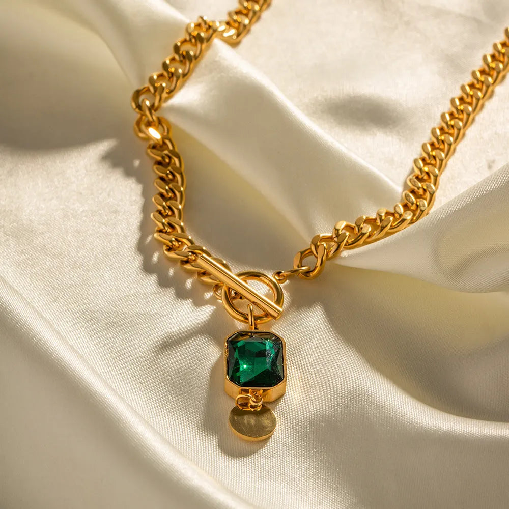 Gold French retro necklace with geometric round pendant on Cuban link chain