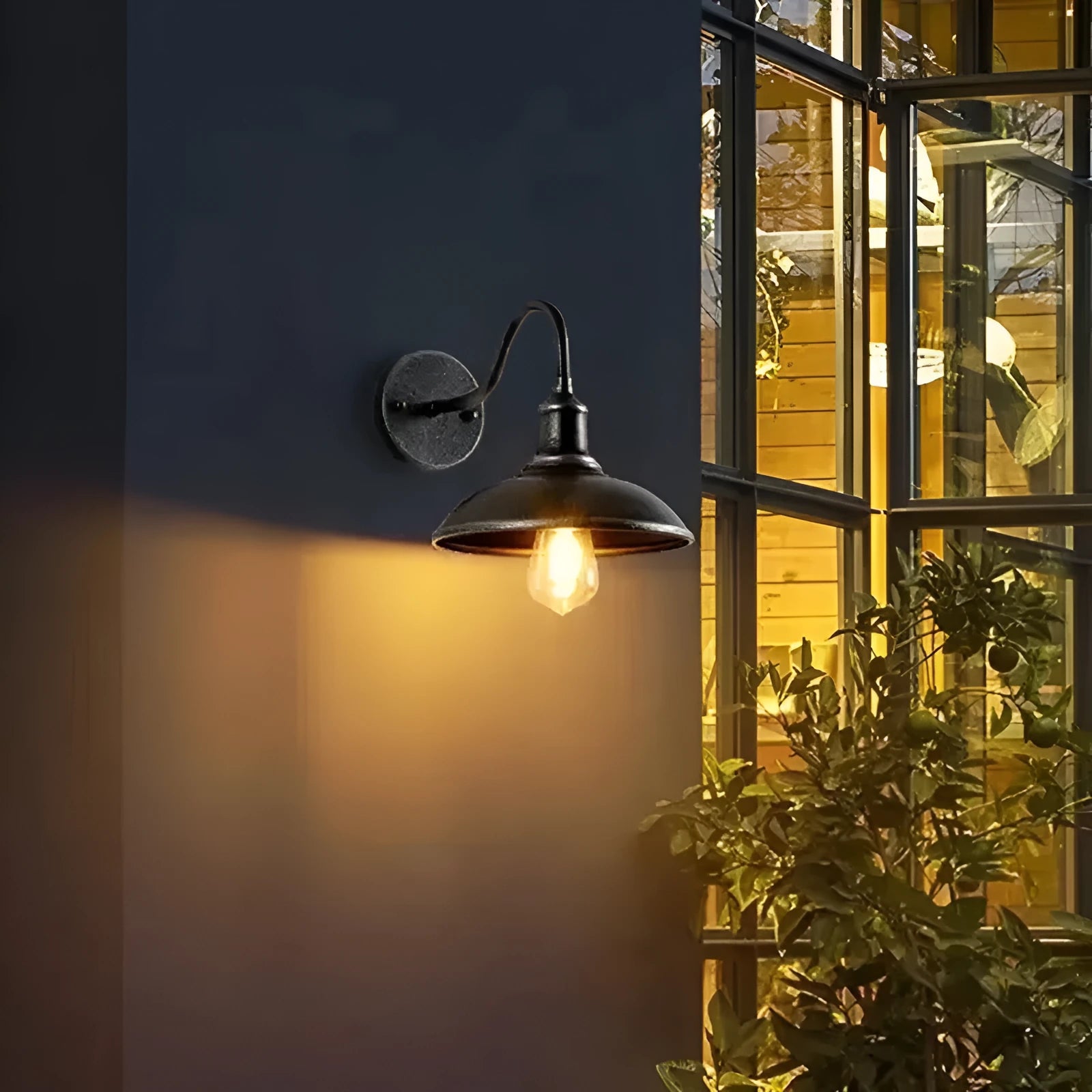 Retro style silver courtyard wall lamp mounted at right angle on villa exterior wall
