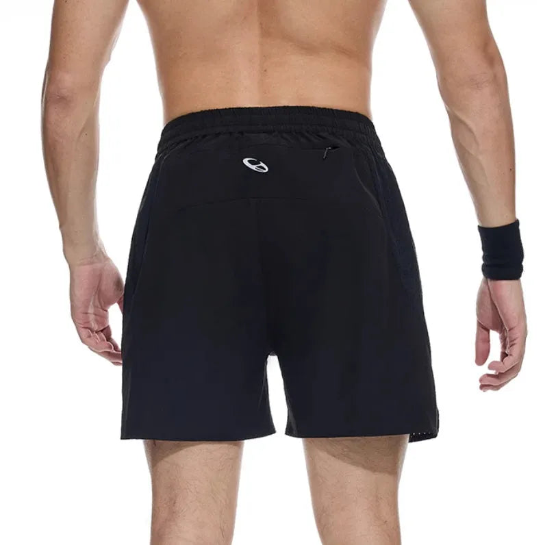 Laser-stitched black running shorts with stretch Spandex fabric laid flat.