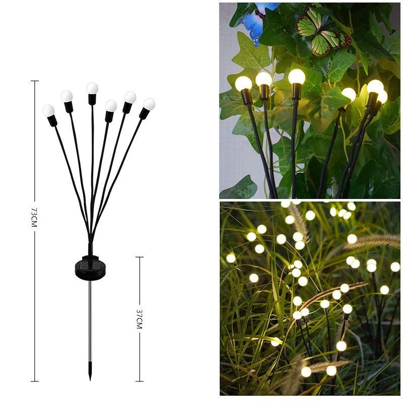 Solar-powered LED garden ground light with multiple LED heads and a stainless steel ground spike.
