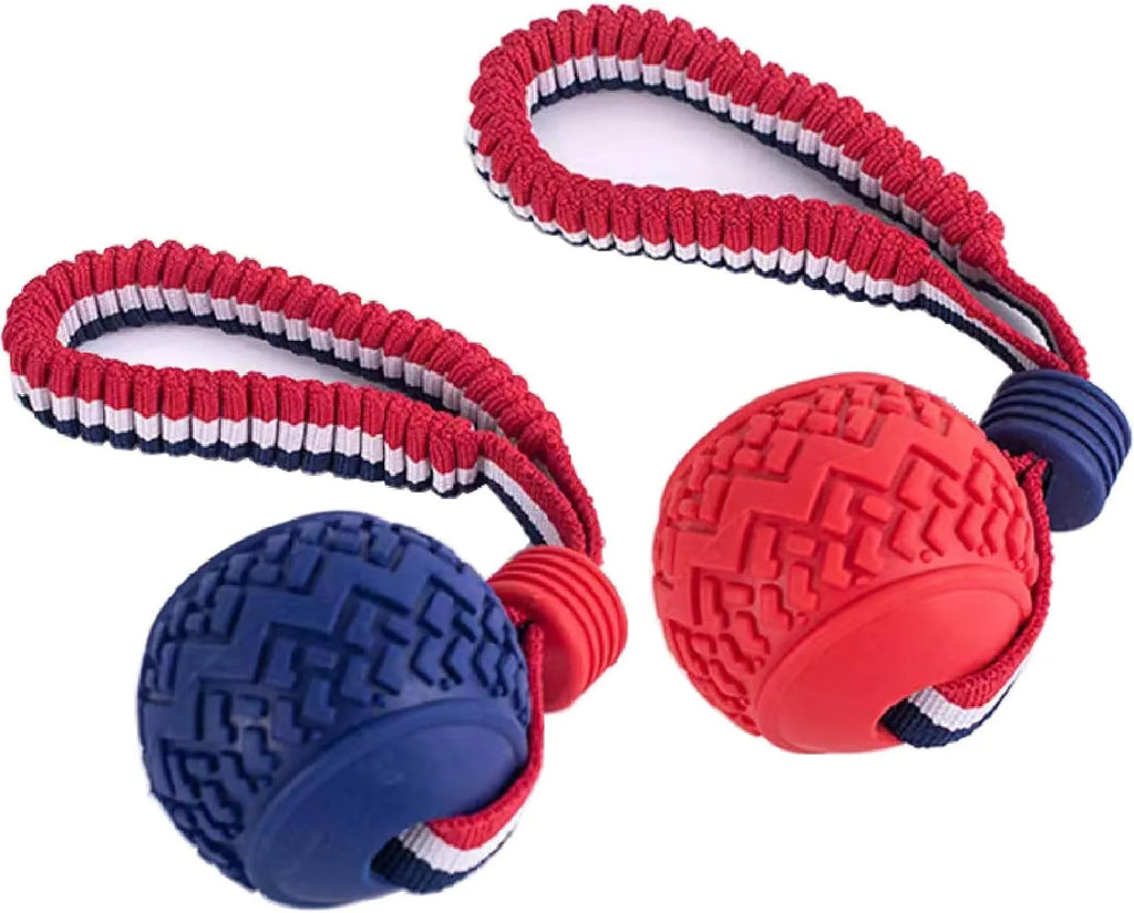Blue natural rubber dog ball with rope toy showing textured surface, sized for medium and small dog breeds