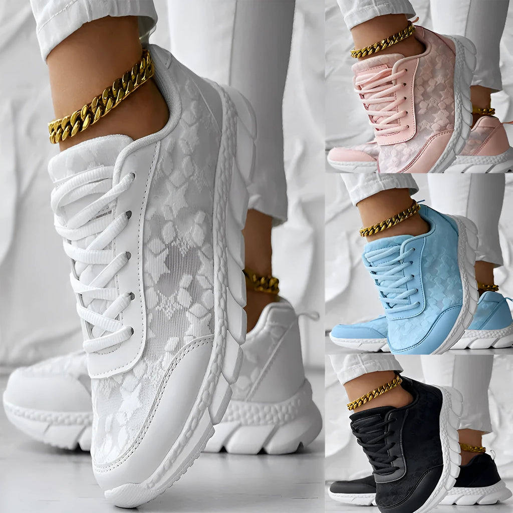 Women's canvas sports running shoes with flat heel in white, black, blue or pink colours