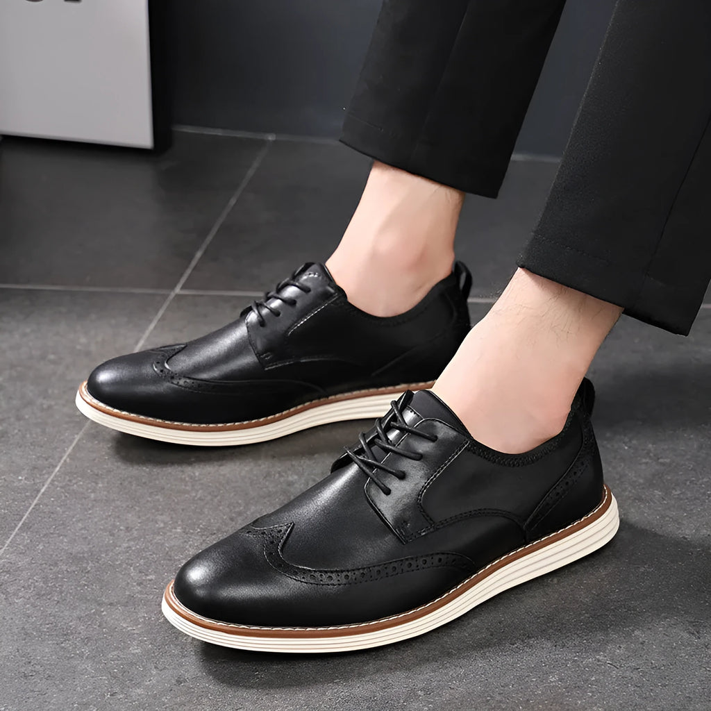 Men's black slip-on casual shoes with PU leather upper and round toe.