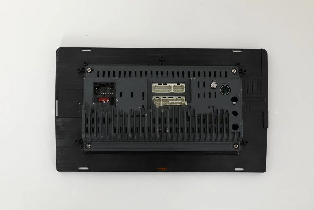 Black 10.1 inch Android car stereo touchscreen head unit with GPS antenna and connection cables