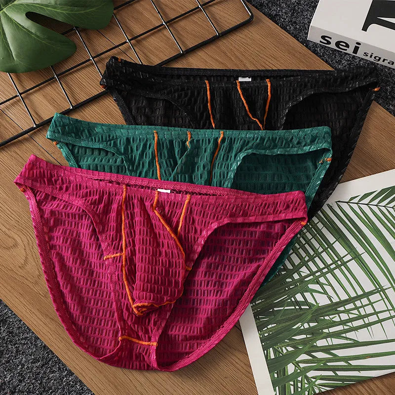 Men's low waist ice silk lace briefs in white, black, green, red, and purple on a size chart.