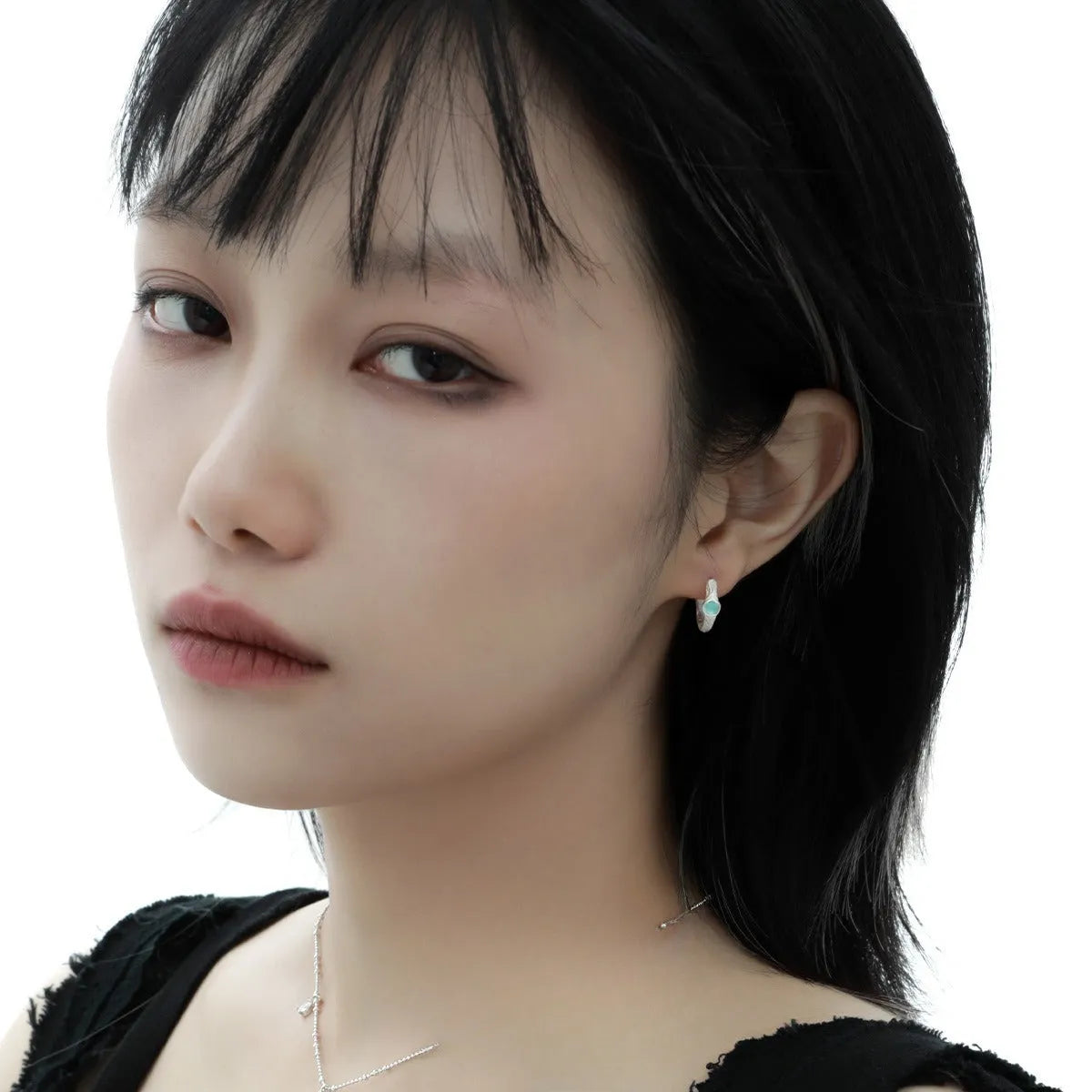 925 sterling silver geometric ear clips with burnt silver electroplated finish and round design elements