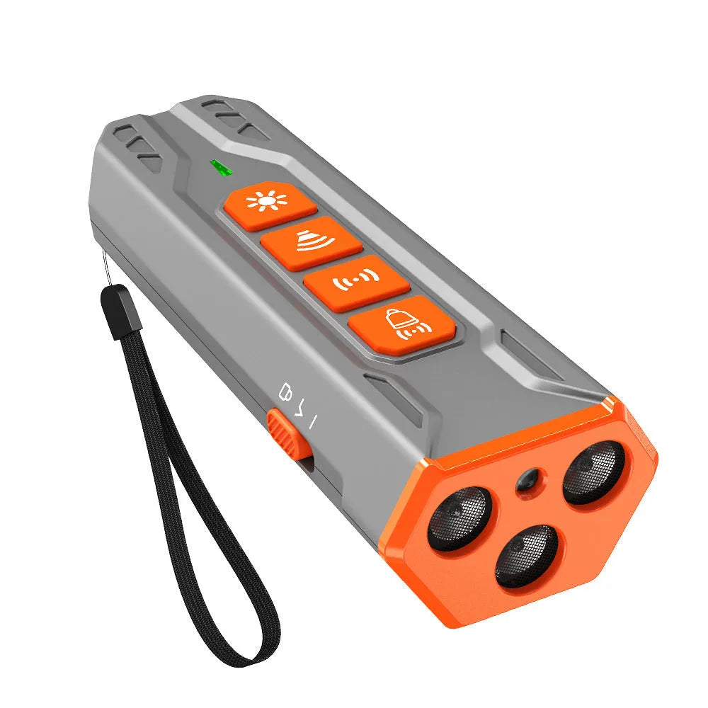 Grey orange and black orange three-head ultrasonic dog trainer for outdoor pet behaviour control.