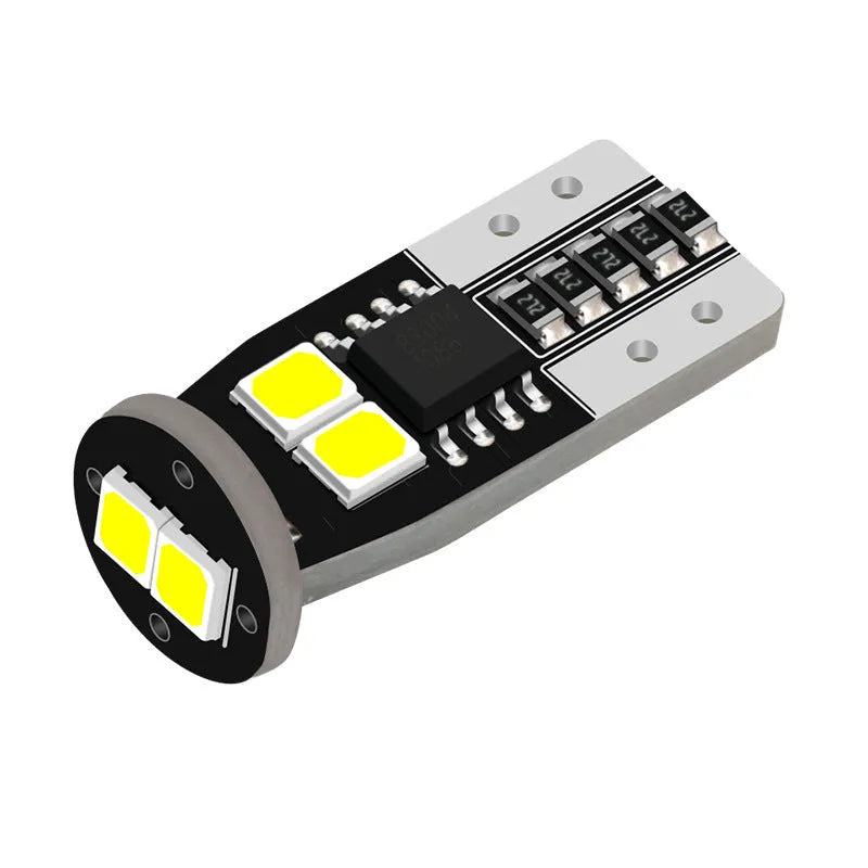 Small white 12V car number plate reading lamp with fibreglass housing.