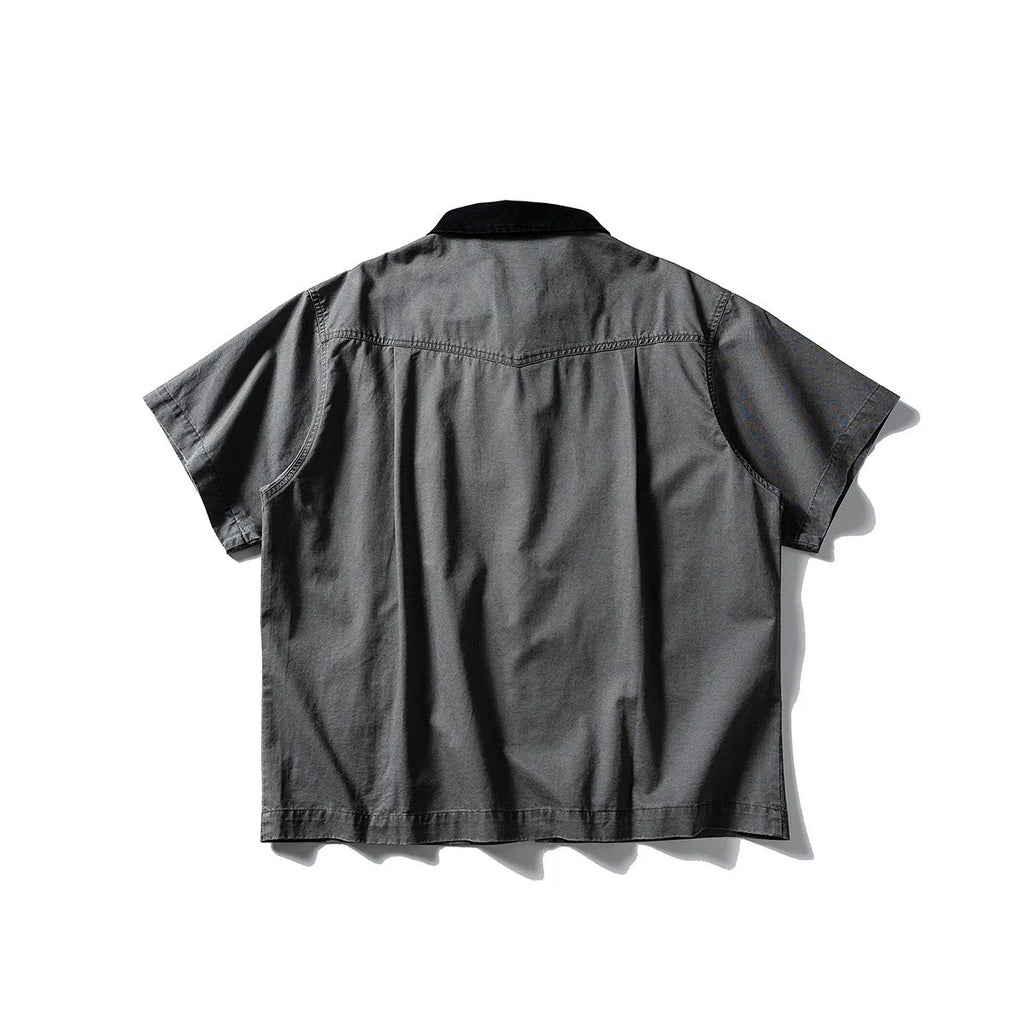 Short sleeve washed cotton overalls shirt in loose cardigan style, khaki colour, on hanger